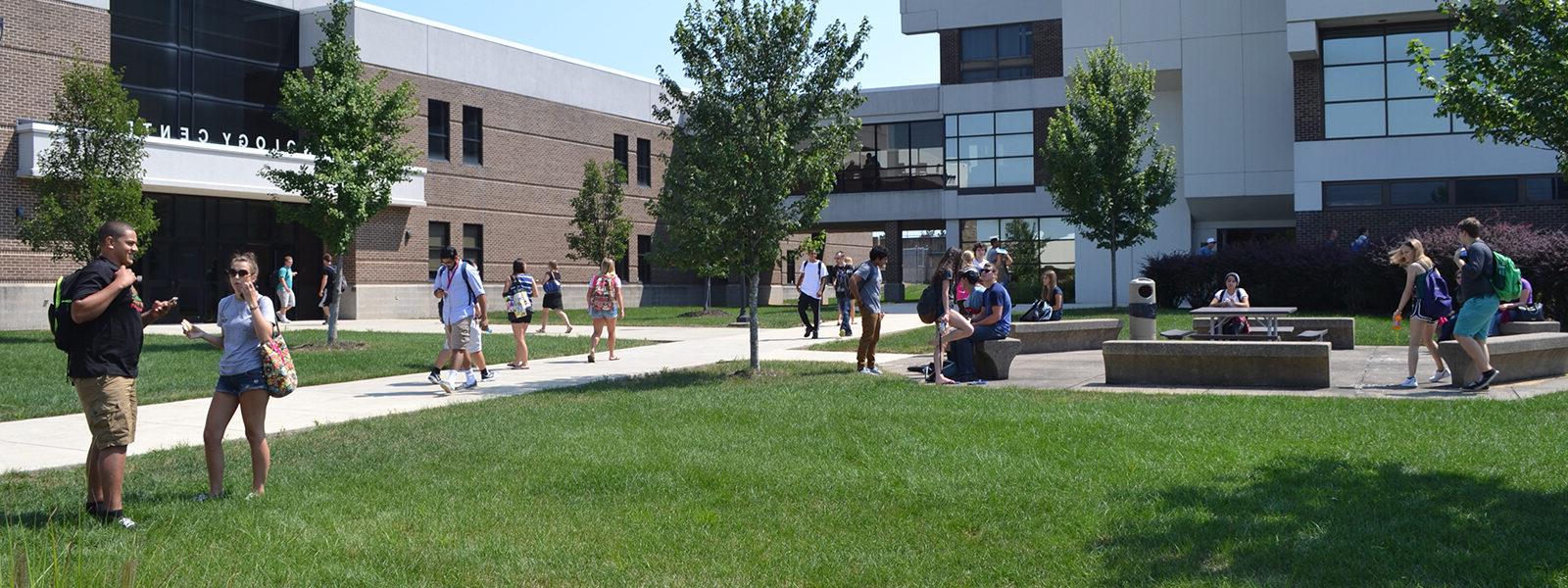 Image of students outside on campus